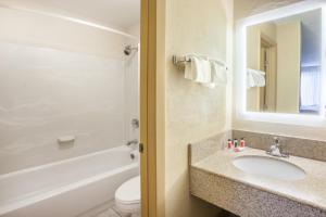 Double Room with Two Double Beds - Non-Smoking room in Howard Johnson by Wyndham Romulus Detroit Metro Airport