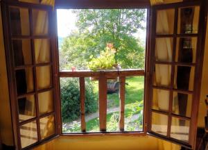 B&B / Chambres d'hotes La Boursaie : Chambre Familiale - Vue sur Jardin