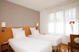 Appart'hotels Sejours & Affaires Paris-Nanterre : photos des chambres