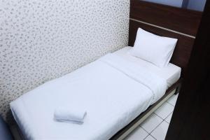 Best Location 2BR Menteng Square Apartment By Travelio