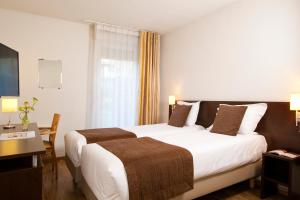 Appart'hotels Sejours & Affaires Caen Le Clos Beaumois : photos des chambres