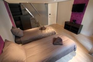 Appartements Residence du Louvre - Apartments - Prime location Palais & Croisette - Luxury Stay by LRA Cannes : photos des chambres