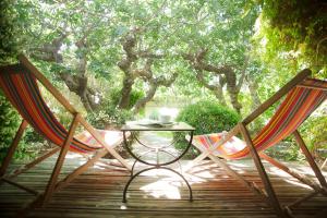 Hotels Hotel Sous les Figuiers : photos des chambres