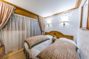 Hotels Chalet-Hotel Neige et Roc, The Originals Relais (Hotel-Chalet de Tradition) : photos des chambres