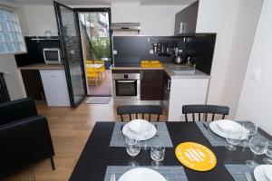 Appartements Le Courtoisville Apartment : photos des chambres