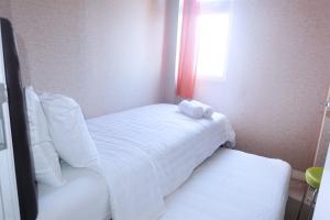 Good 2BR Apartment At Green Pramuka City By Travelio