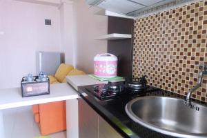 Good 2BR Apartment At Green Pramuka City By Travelio