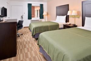Double Room with Two Double Beds - Smoking room in Americas Best Value Inn Clute