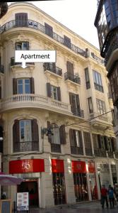 Historic 19th-Century Apartment with Balcony Overlooking Plaza
