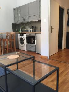 Appartements Coeur de ville grand-rue Jean Moulin : photos des chambres