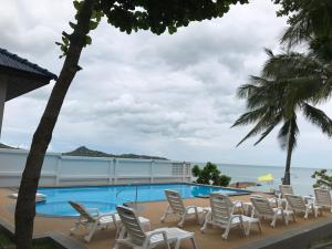 Marina Beach Resort hotel, 
Koh Samui, Thailand.
The photo picture quality can be
variable. We apologize if the
quality is of an unacceptable
level.