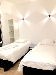 Appartements Urban et Pure : photos des chambres