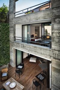 Suite with Balcony and Garden View room in Teku Sardinia Boutique Hotel