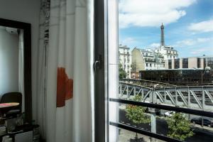 Hotels Le Parisis - Paris Tour Eiffel : photos des chambres