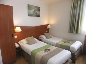 Hotels Hotel Restaurant Kyriad Brive Centre : Chambre Double avec 2 Lits Simples