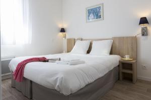 Appart'hotels Residence Prestige Odalys Le Domaine des Pins : photos des chambres