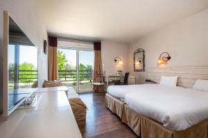 Hotels L'Ermitage Hotel & Restaurant : photos des chambres