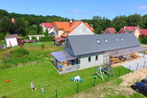 Ferienhaus Kapitanskie Domki Trzęsacz Polen