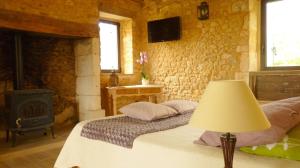 B&B / Chambres d'hotes Aux fontaines d'Eyvigues : photos des chambres