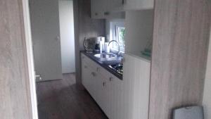 Three-Bedroom Chalet room in Minicamping Wisse
