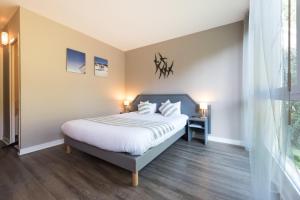 Hotels Latitude Ouest Hotel Restaurant & Spa : photos des chambres