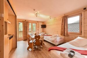 Hotels Loc'Hotel Alpen Sports : photos des chambres