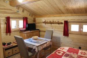Chalets Le Refuge des Marmottes : photos des chambres