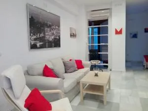Céntrico Apartamento con Patio Privado - Camas
