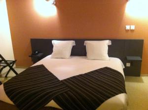 Hotels Fasthotel Le Rale Des Genets : photos des chambres