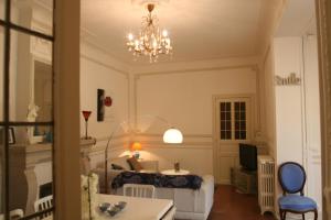 Appartements Appart charme Arenes Nimes : photos des chambres