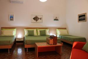 Double Room with 2 Extra Beds room in Casa Noemi b&b