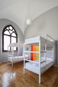 Bed in 4-Bed Mixed Dormitory Room room in Babila Hostel & Bistrot