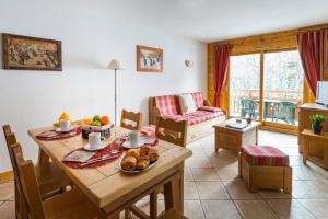 Appartements travelski home premium - Residence Le Hameau du Rocher Blanc 4 stars : photos des chambres