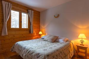 Appartements travelski home premium - Residence Le Hameau du Rocher Blanc 4 stars : Appartement en Duplex