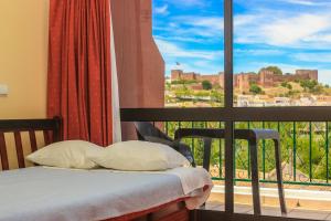 Triple Room with Castle View room in Hotel Colina Dos Mouros