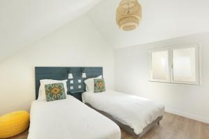 Appartements Les Lilas Serviced Apartments : photos des chambres