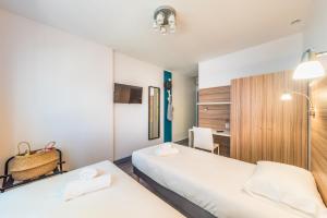 Hotels L'Oasis : photos des chambres