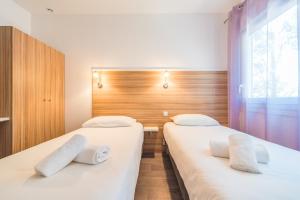 Hotels L'Oasis : photos des chambres