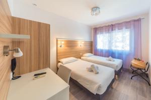 Hotels L'Oasis : photos des chambres