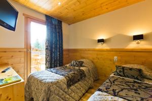 Hotels Logis Hotel & Spa Beau-Site : photos des chambres