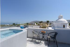 Ikies Santo Filoxenia Apartments - 4-star hotels in Karterados
