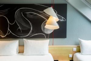 Hotels ibis Cherbourg La Glacerie : photos des chambres