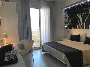 Triple Room with Balcony room in QuiHotel