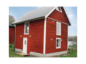 Three-Bedroom Holiday home Kisa with Sea view 09