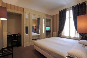 Hotels Le Grand Hotel : photos des chambres