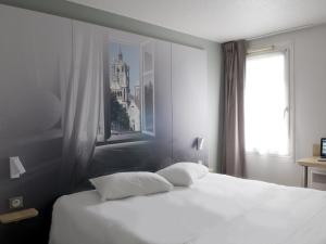 Hotels B&B HOTEL Saint-Quentin : photos des chambres