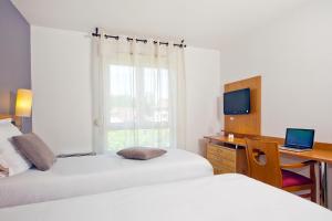 Appart'hotels Sejours & Affaires Annecy Le Pont Neuf : photos des chambres