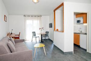 Appart'hotels Sejours & Affaires Annecy Le Pont Neuf : photos des chambres