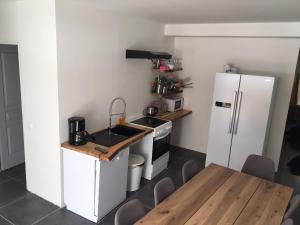 Appartements Riders Apartments : photos des chambres