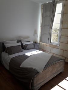 Appartements Entre Estuaire et Citadelle : photos des chambres